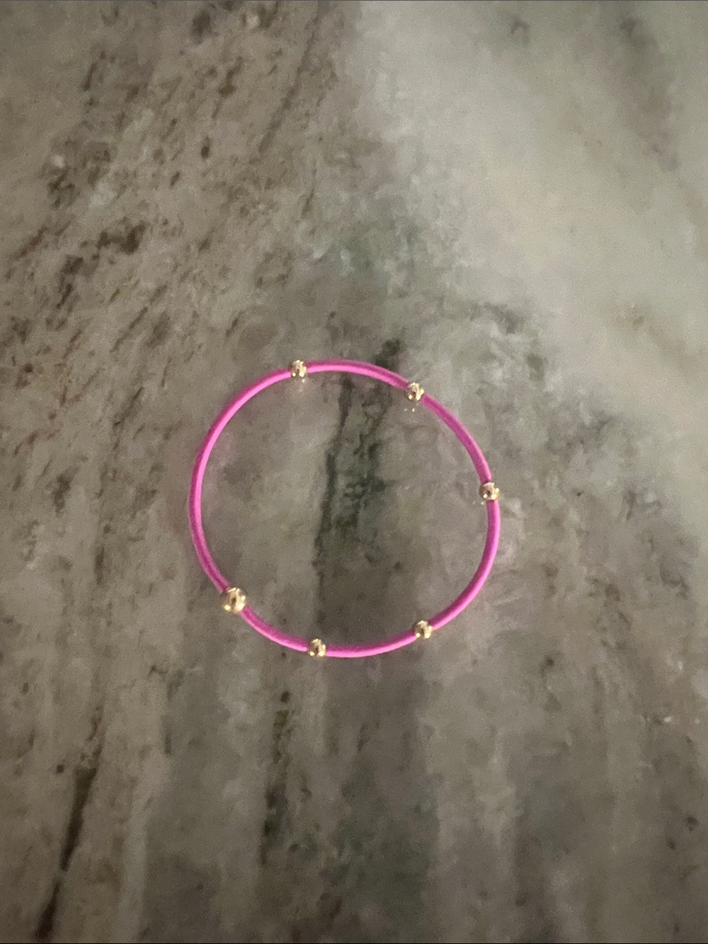Enewton gold and magenta hair tie/bracelet